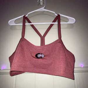Red stripe tank top with button detailing.